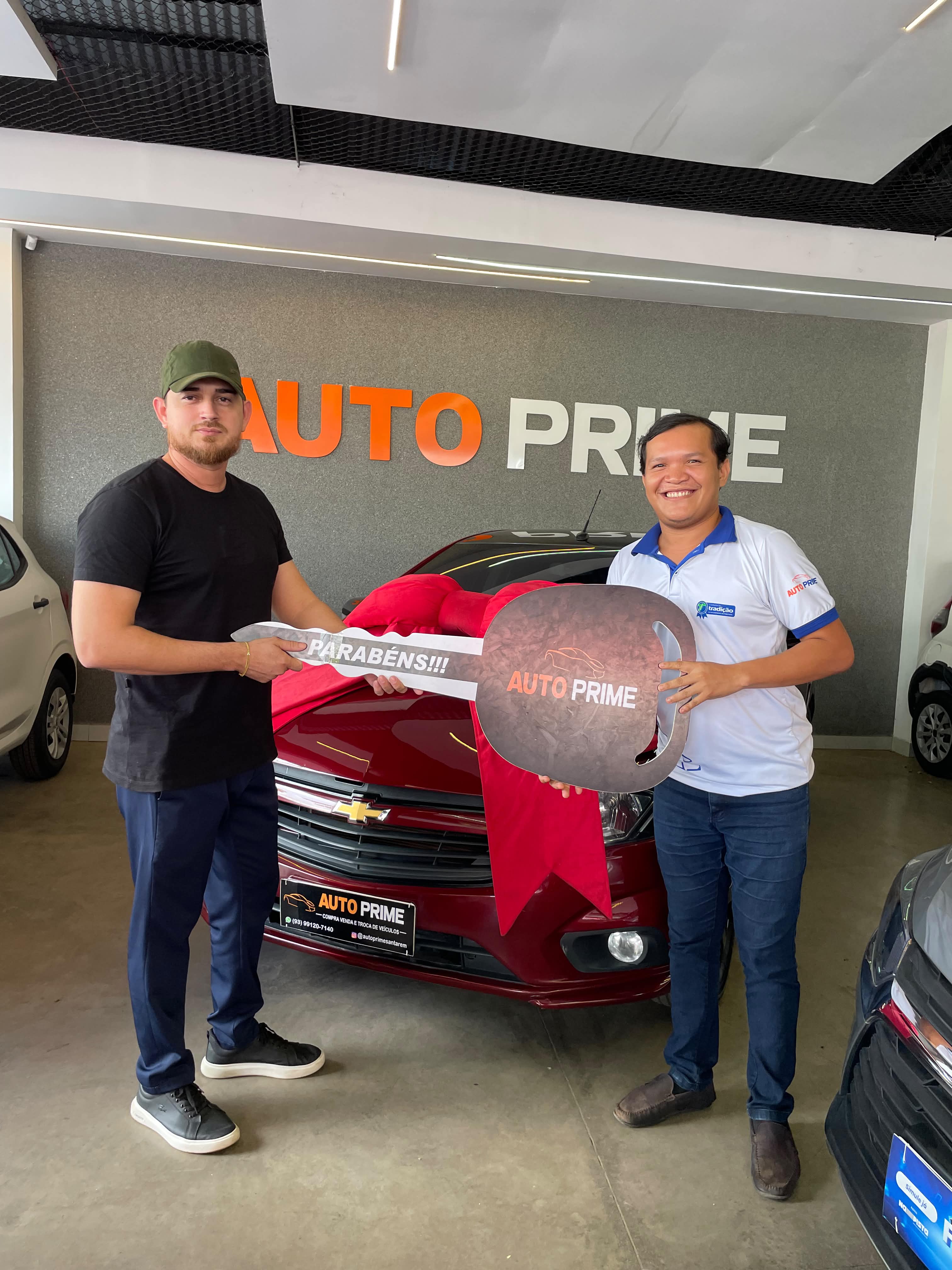 Cliente contemplada com seu veículo