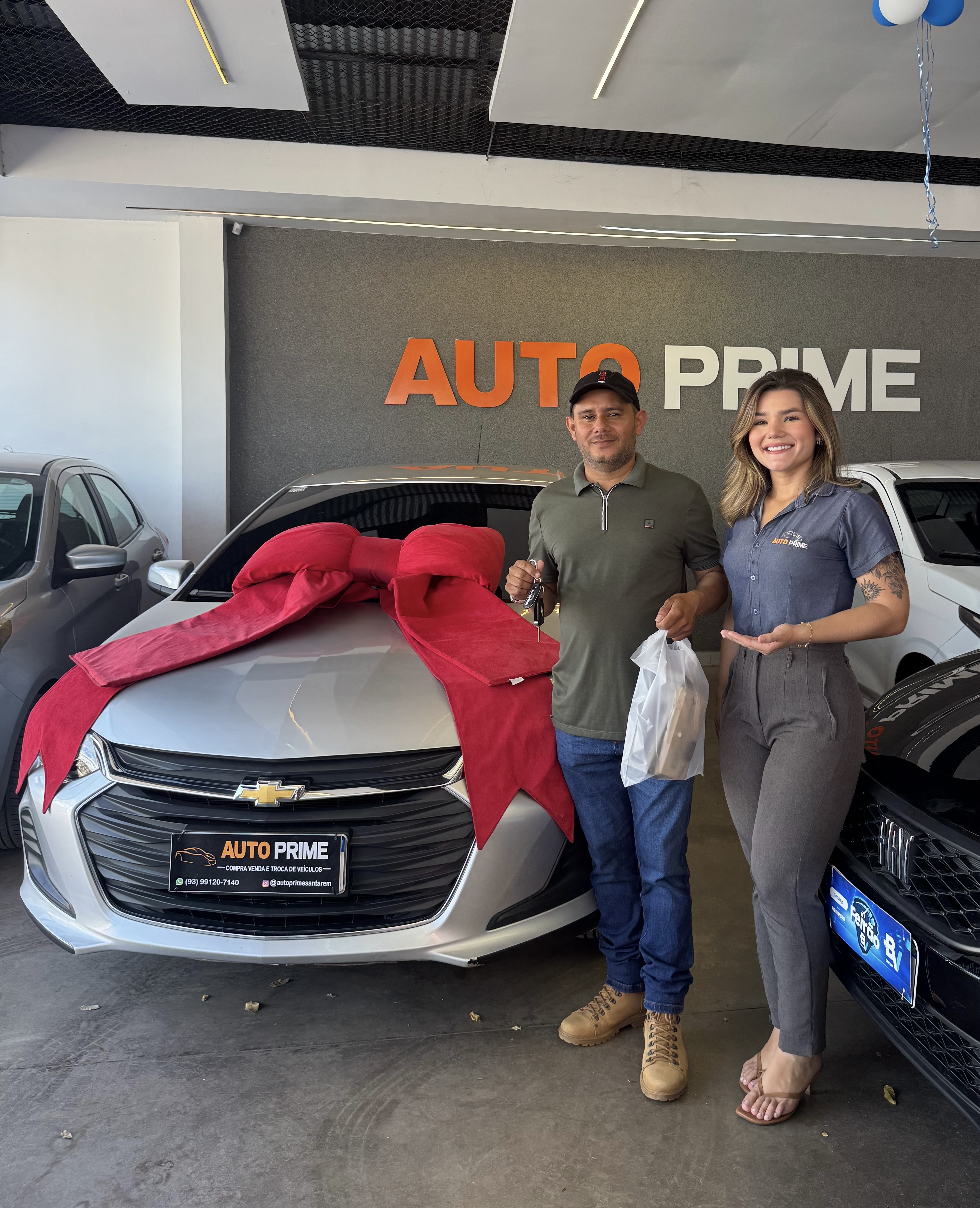 Cliente com veículo adquirido na Auto Prime